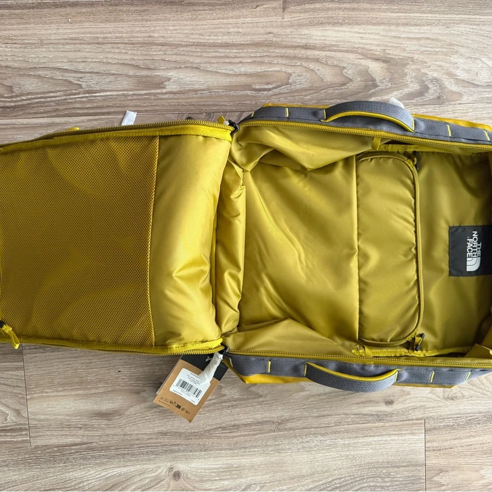 The North Face Men's Yellow Backpack with Gray Accents